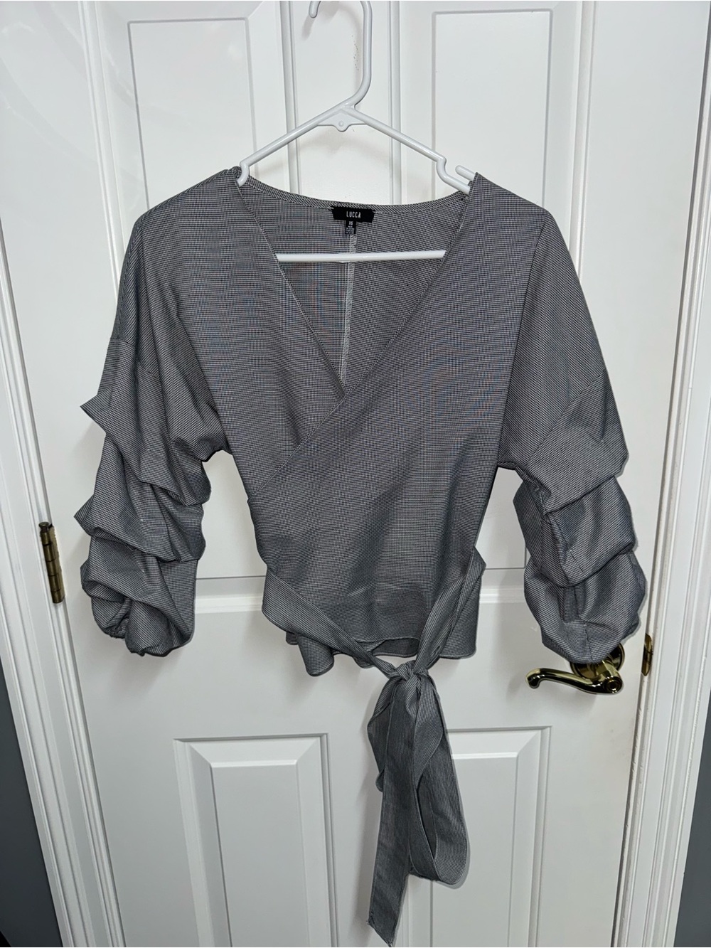 Lucca Black and White Wrap Blouse with Tiered Puff Sleeves